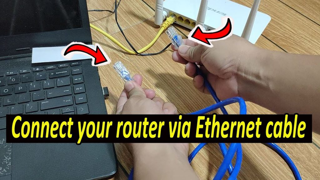 recover forgotten wifi password from router Ethernet cable plugged into router LAN port with laptop connected