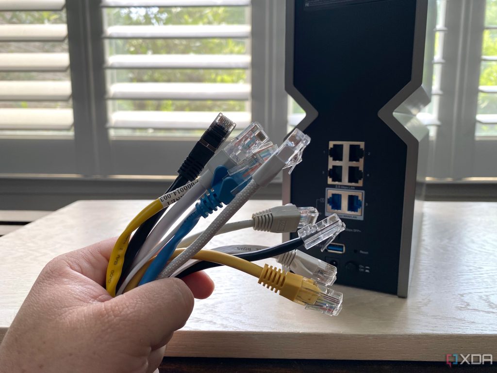 recover wifi password from d link router D-Link router back panel with Ethernet cable plugged into LAN port