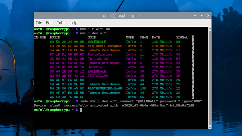 wifi password recovery tutorial linux Linux terminal showing nmcli command with -s flag and password displayed